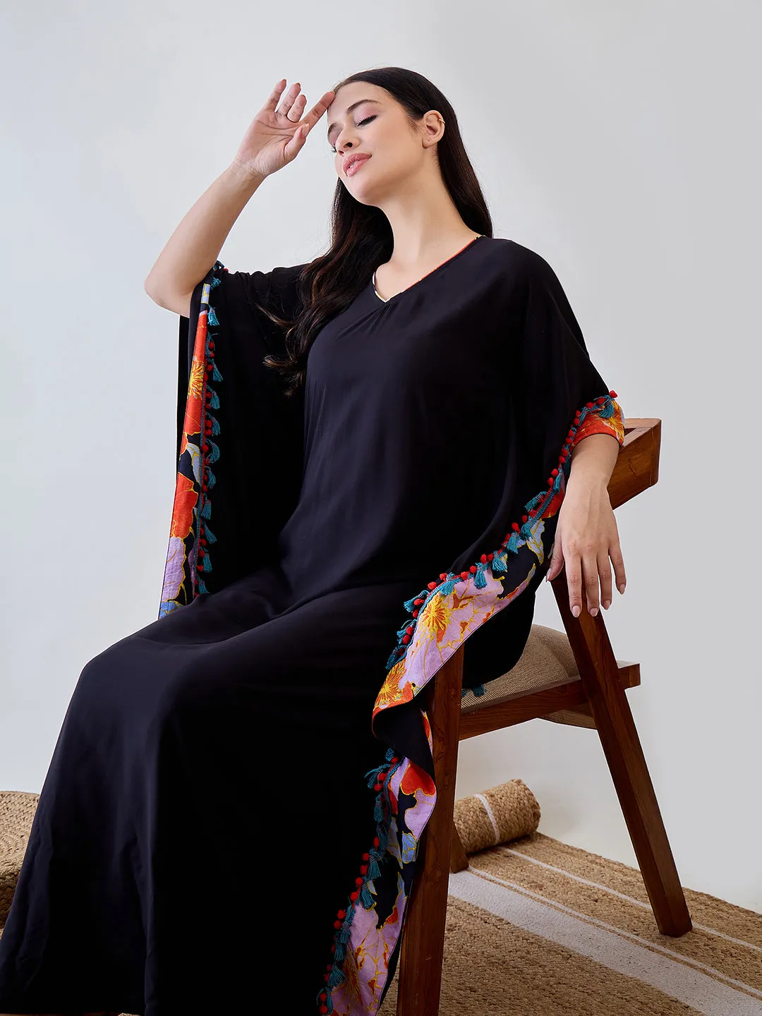 Bright Borderd Black Solid Soft Modal Kaftan Embellished With Pom Pom Lace