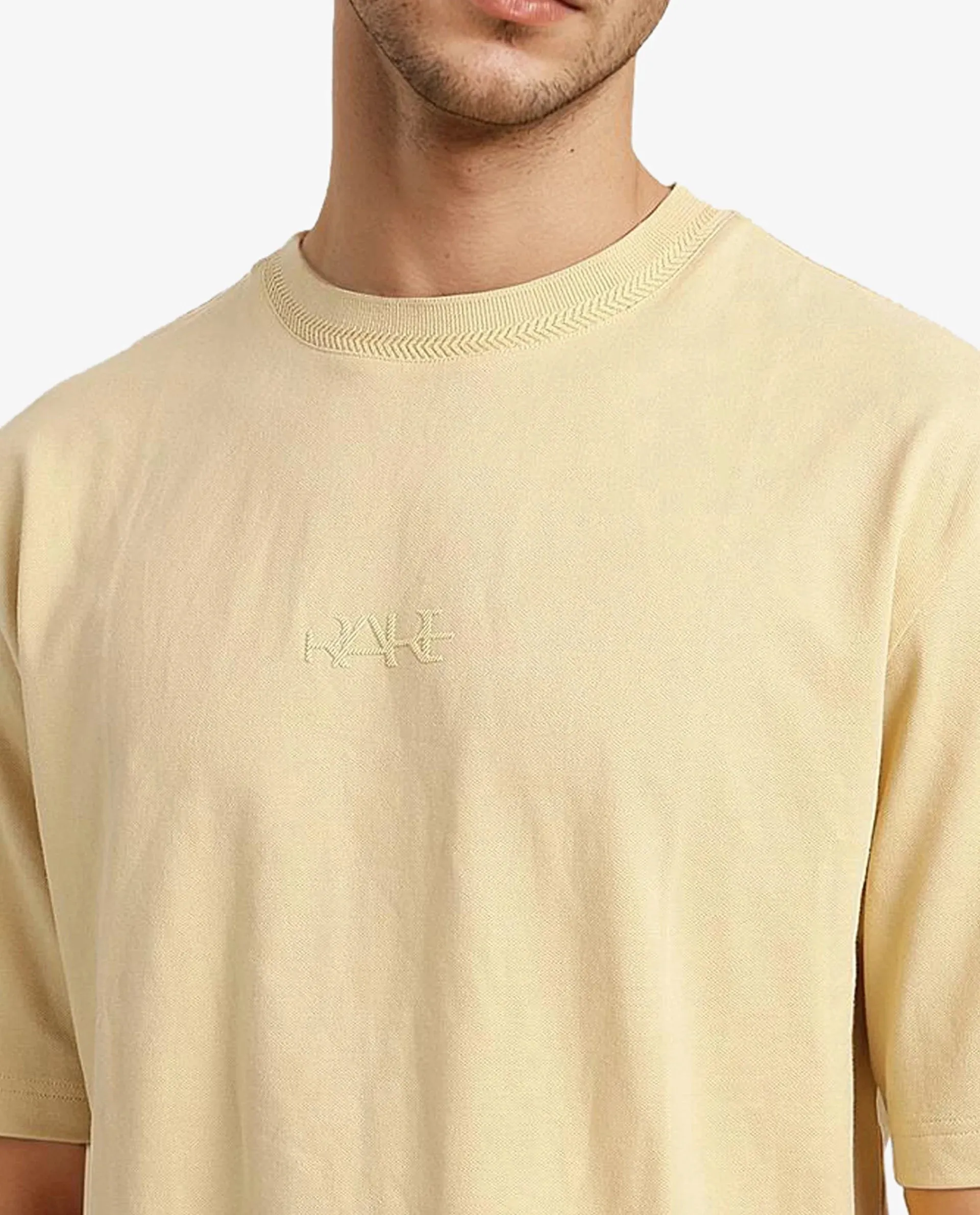 Rare Rabbit Mens Heros-1 Light Yellow Cotton Lycra Fabric Blend Drop Shoulder Short Sleeve Oversized Fit Solid T-Shirt